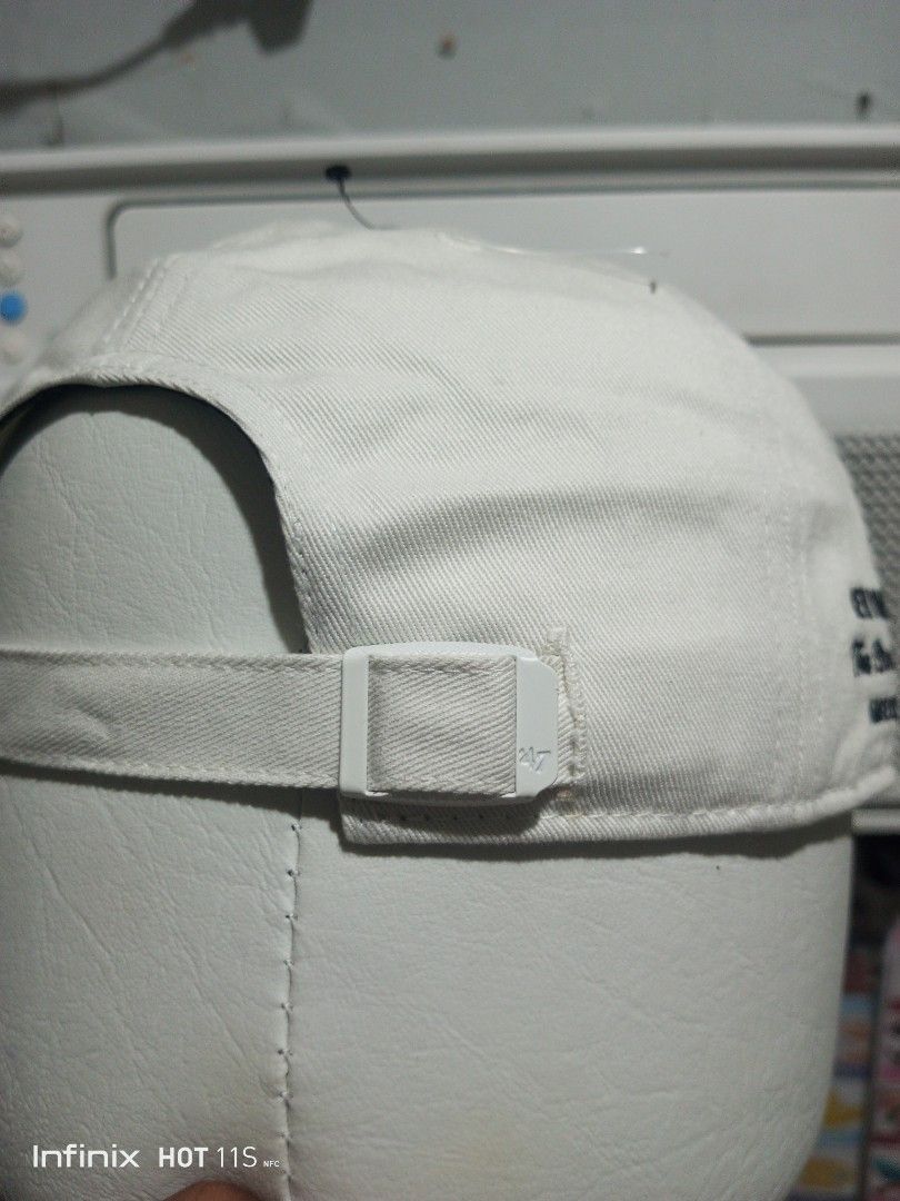 '47 New York Yankees MLB Baseball Cap Hat (Category: Caps & Hats) located in Las Pinas. Submitted by rzzr_thrift25 (Listing ID 1465781002, Image 3). Description: - Brand: '47 Brand - Team: New York Yankees (American League - The Bronx, New York) - Condition: Brand new, unworn with original retail tag ($38.00) and brim sticker attached - Colorway: Two-tone (Off-white crown / Navy blue curved brim) - Details: Embroidered front NY logo, side letteri