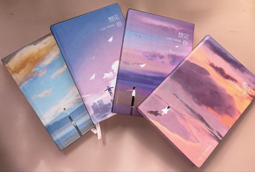 4 pcs Hardcover Notebook Diary (Category: Storybooks) located in Manila. Submitted by jhie24 (Listing ID 1465820553, Image 1). Description: Brand new with minor dents! Negotiable! - Set of 4 aesthetic hardcover notebooks with sky and sunset cover art - Features English ('Love Poems', 'I Wanna See You') and Chinese titles on the front - Blank pages inside with cute small illustrations at the bottom corners - Includes a built-in ribbon bookmark at 