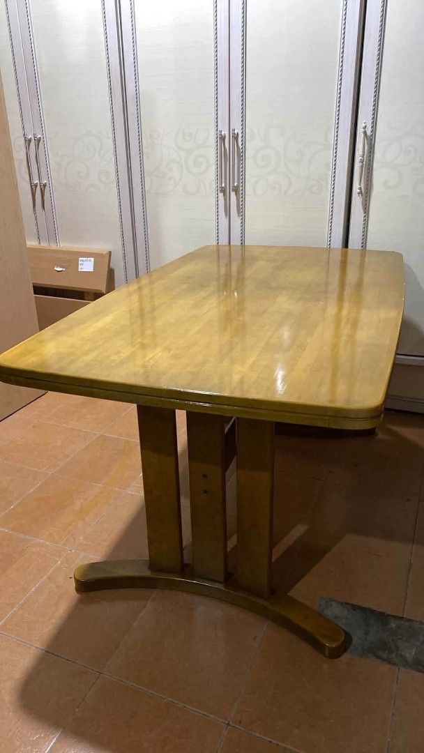 4 Seater Dining Table (Category: Tables & Sets) located in Quezon City. Submitted by dannikkishoppe2 (Listing ID 1465867251, Image 2). Description: 4 Seater Dining Table ‼️₱6000‼️ L53 W31.5 H27 inches *solid wood *removable legs • Design: Rectangular with safe rounded corners and sturdy curved runner feet • Finish: Glossy light brown with natural wood grain pattern Please manage your expectations as there might be minimal flaws. Color may vary du