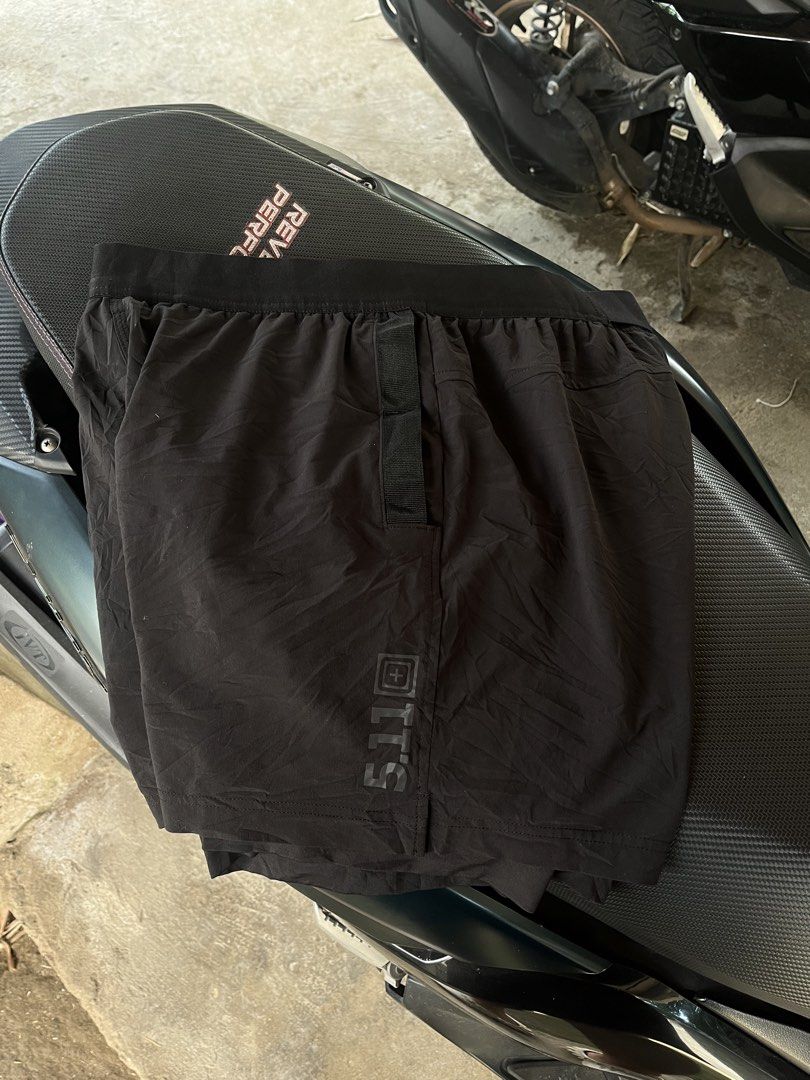 5.11 Tactical PT-R Physical Training Ready Shorts (Category: Shorts) located in Bacolod City. Submitted by ejaybancal2 (Listing ID 1465945558, Image 3). Description: - Brand: 5.11 Tactical PT-R Training Shorts - Color: Black - Size: Large - Style: Built-in liner with elastic waistband and logo tag - Features: Lightweight performance material and convenient side pockets - Condition: Clean, well-maintained, and ready to wear - Ideal for: Gym sessio