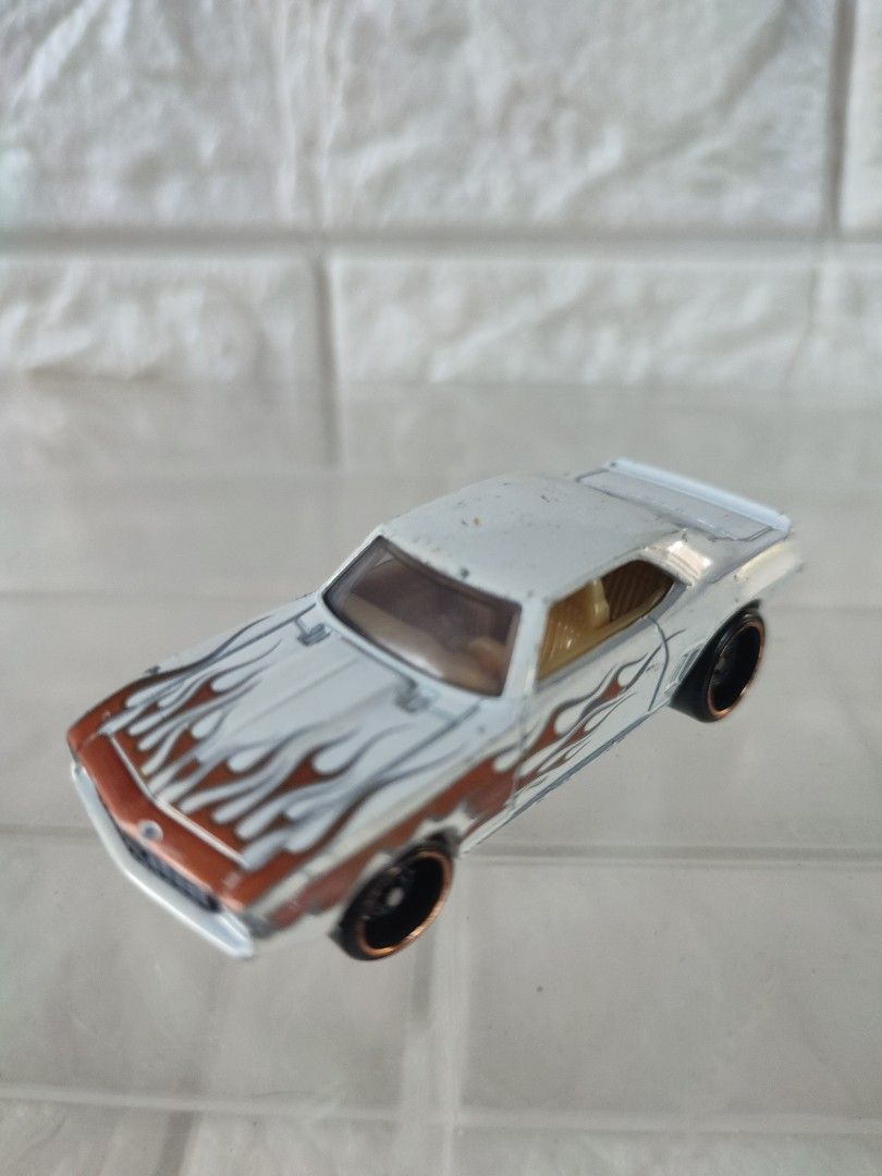 69 camaro 2007 loose hotwheels (Category: Vehicle & Diecast Models) located in Narvacan. Submitted by jigger85 (Listing ID 1465777359, Image 2). Description: 93 percent condition paint chips hairline bought in UK loc. ilocos sur can ship thru JNT or LBC.