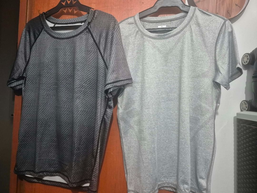 7 Dri-fit t-shirts 2 Sando (Category: Activewear) located in Pasig City. Submitted by kathee88 (Listing ID 1465932785, Image 1). Description: - Bundle includes 7 athletic t-shirts - 1 original adidas sando and 1 plain sando - Colors: Dark grey (textured pattern with raglan sleeves) and light heather grey (crewneck) - Fit: Regular sizing, short sleeves - Material: Lightweight and breathable - Ideal for: Gym workouts, running, or casual everyday we
