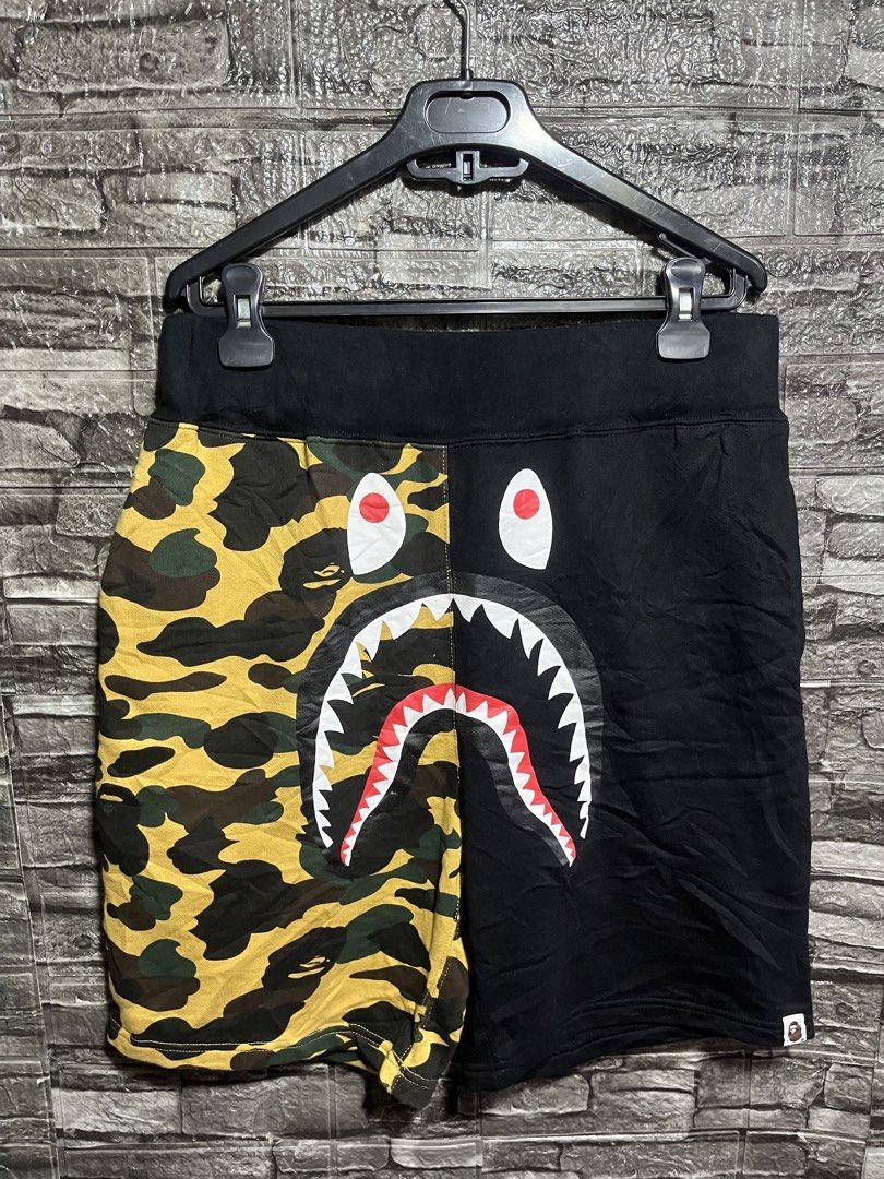 A bathing Ape BAPE 1st Camo Side Shark Sweat Short (Category: Shorts) located in Manila. Submitted by flex_curation (Listing ID 1465850270, Image 1). Description: 32-34W 21L IN VERY GOOD CONDITION BACOOR CAVITE LOC.