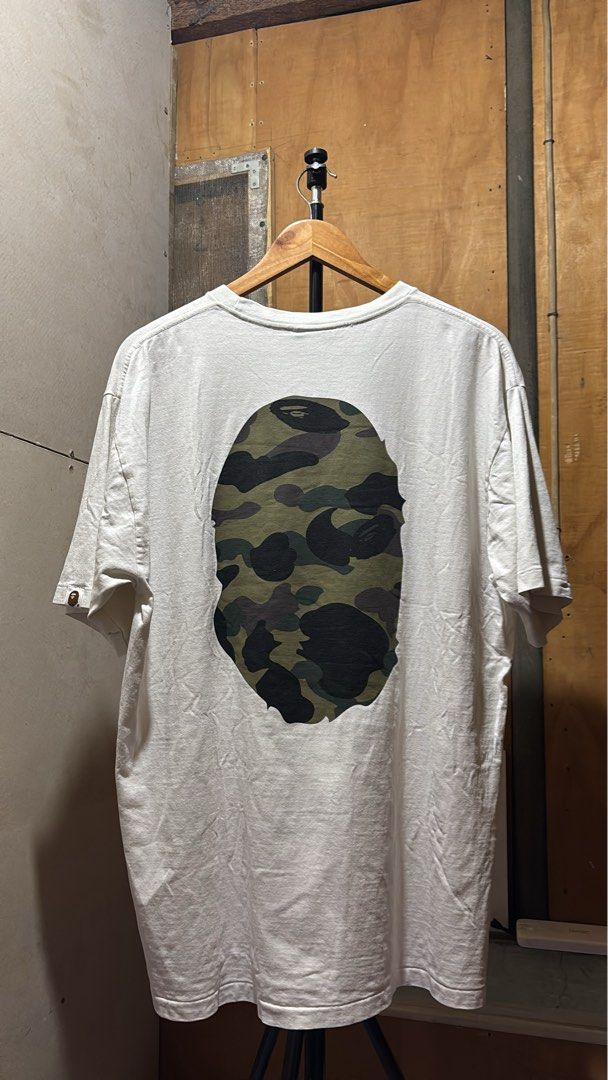 A Bathing Ape Bape Camo Ape Head Tee 2XL (Category: Tshirts & Polo Shirts ) located in Manila. Submitted by kobthrift.1223 (Listing ID 1465912166, Image 2). Description: - Brand: A Bathing Ape (Bape) bape mirror color rate 9/10 30x23 2200 negotiable .