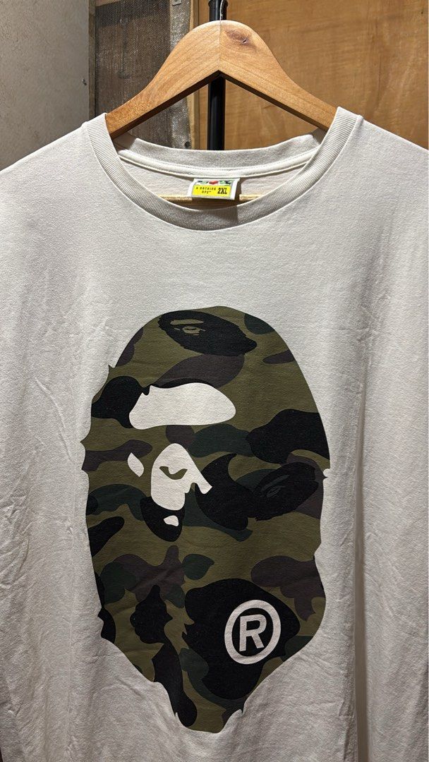 A Bathing Ape Bape Camo Ape Head Tee 2XL (Category: Tshirts & Polo Shirts ) located in Manila. Submitted by kobthrift.1223 (Listing ID 1465912166, Image 3). Description: - Brand: A Bathing Ape (Bape) bape mirror color rate 9/10 30x23 2200 negotiable .