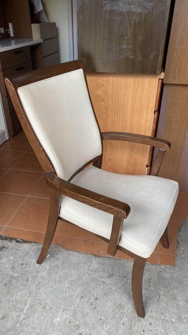 Accent Armchair (Category: Chairs) located in Quezon City. Submitted by dannikkishoppe2 (Listing ID 1465871715, Image 3). Description: Accent Armchair ‼️₱3800‼️ L22 W18 H17;36 inches • Materials: Sturdy dark wood frame with cream/off-white fabric cushions • Features: Comfortable upholstered backrest and seat, stylish curved armrests • Condition: Good and sturdy, with normal wear on the wooden armrests from regular use • Perfect for: Living rooms,