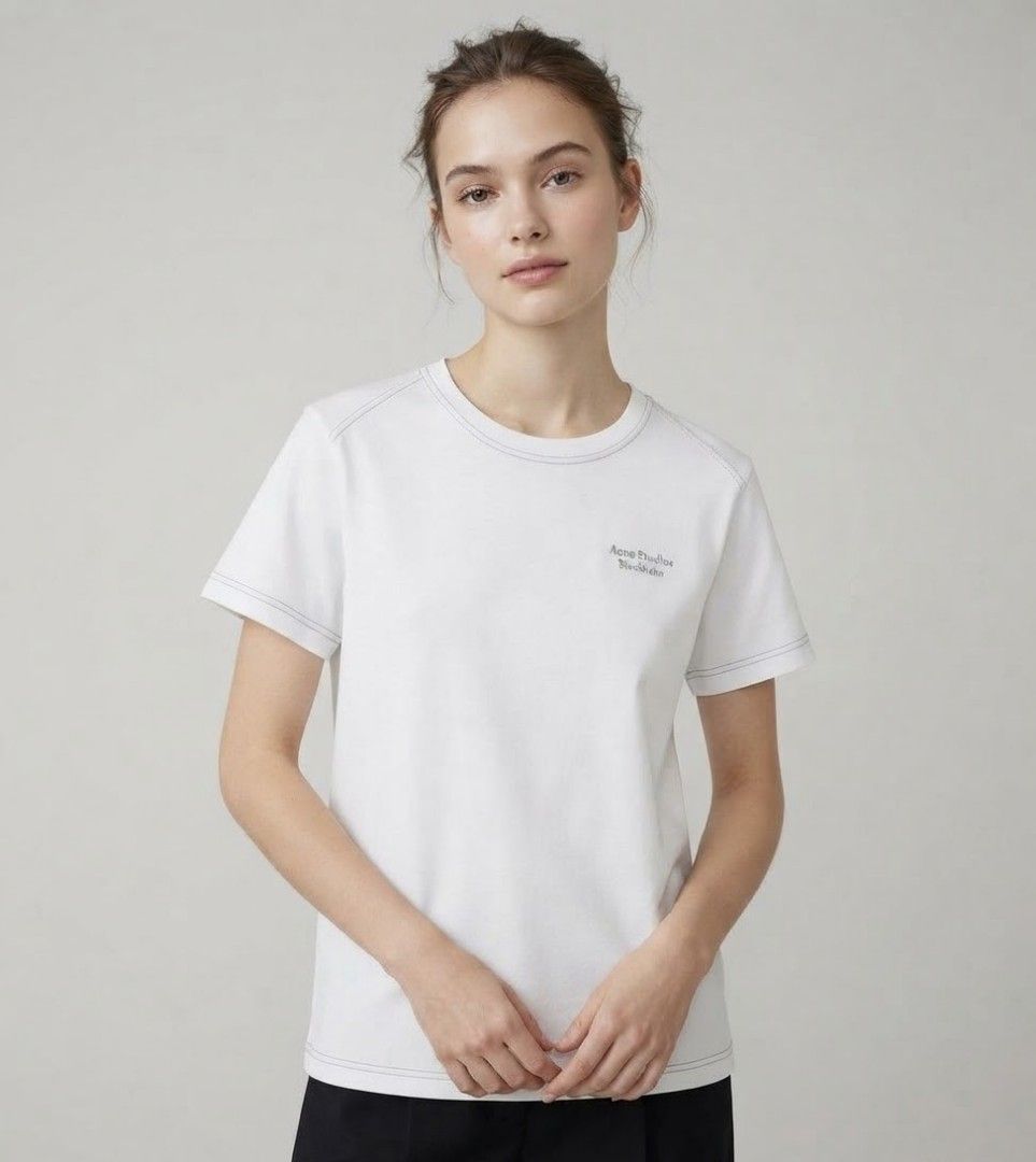 ACNE STUDIOS - Swedish luxury label (Category: Shirts) located in Iba. Submitted by selector_items (Listing ID 1465885412, Image 2). Description: ### *Product Details:* - *Brand*: ACNE STUDIOS - Swedish luxury label - *Model*: "Acne Studios Stockholm" Embroidered Logo Tee - *Color*: White with grey tonal embroidery + contrast stitching - *Material*: 100% COTTON - *Made in*: PORTUGAL 🇵🇹 - *Style code*: FN-WN-TSHI000011 - *Details*: Crew neck, sh