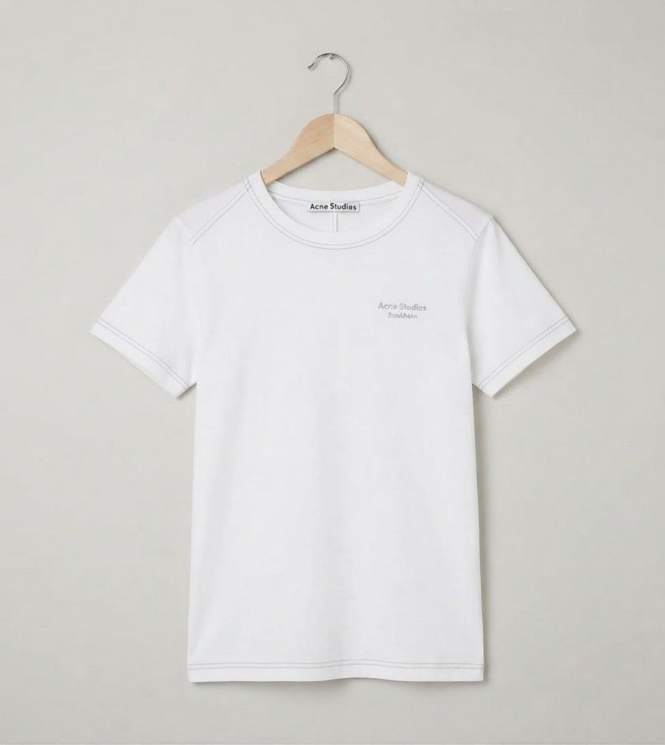 ACNE STUDIOS - Swedish luxury label (Category: Shirts) located in Iba. Submitted by selector_items (Listing ID 1465885412, Image 1). Description: ### *Product Details:* - *Brand*: ACNE STUDIOS - Swedish luxury label - *Model*: "Acne Studios Stockholm" Embroidered Logo Tee - *Color*: White with grey tonal embroidery + contrast stitching - *Material*: 100% COTTON - *Made in*: PORTUGAL 🇵🇹 - *Style code*: FN-WN-TSHI000011 - *Details*: Crew neck, sh