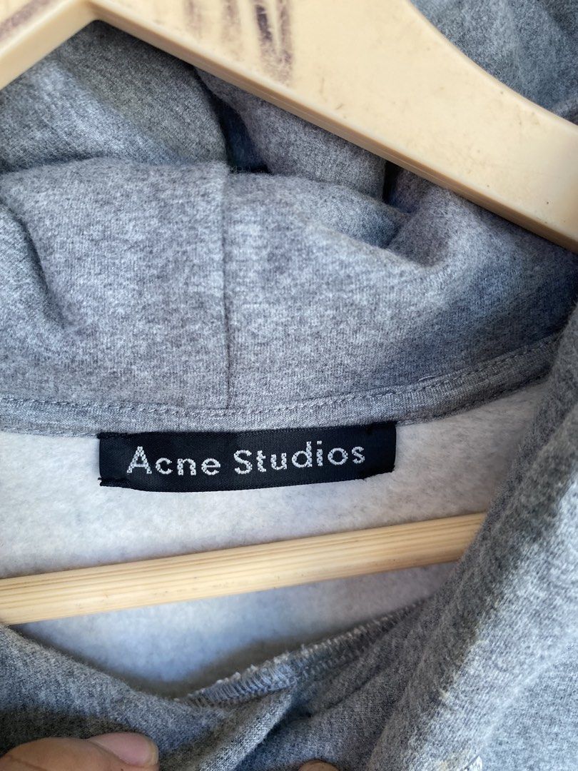 Acne Studios Ferris Face Hoodie Grey (Category: Hoodies) located in Tuguegarao City. Submitted by tumaliuanjohnpeter5-19041 (Listing ID 1465802013, Image 2). Description: - Brand: Acne Studios - Model: Ferris Face Hoodie - Color: dark gray - Size: XS (20.5x25) fit upto medium - Material: 100% heavy cotton, made in Portugal - Features: Signature chest face patch, front kangaroo pocket, adjustable drawstrings, ribbed cuffs and hem - Condition: Clea