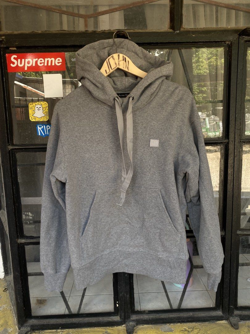 Acne Studios Ferris Face Hoodie Grey (Category: Hoodies) located in Tuguegarao City. Submitted by tumaliuanjohnpeter5-19041 (Listing ID 1465802013, Image 1). Description: - Brand: Acne Studios - Model: Ferris Face Hoodie - Color: dark gray - Size: XS (20.5x25) fit upto medium - Material: 100% heavy cotton, made in Portugal - Features: Signature chest face patch, front kangaroo pocket, adjustable drawstrings, ribbed cuffs and hem - Condition: Clea