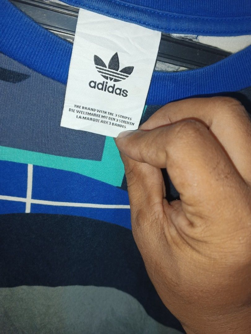 adidas (Category: Activewear) located in Isabel. Submitted by nieljun112187 (Listing ID 1465903259, Image 3). Description: adidas width 22 length 28 colorate 9 no issue.