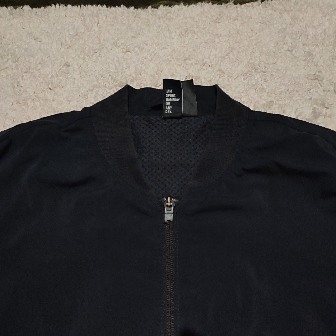 Adidas Black Bomber Jacket with Large Shoulder Logo (Category: Coats, Jackets and Outerwear) located in Manila. Submitted by anthonig (Listing ID 1465872885, Image 2). Description: Color may vary due to lighting Length: 26 inches Width: 22.5 inches Price: 400 pesos Condition: 9.2/10 Issues: last 2 photos PM if interested or for inquiries Meetups within MANILA only Can do shipping at buyers expense.