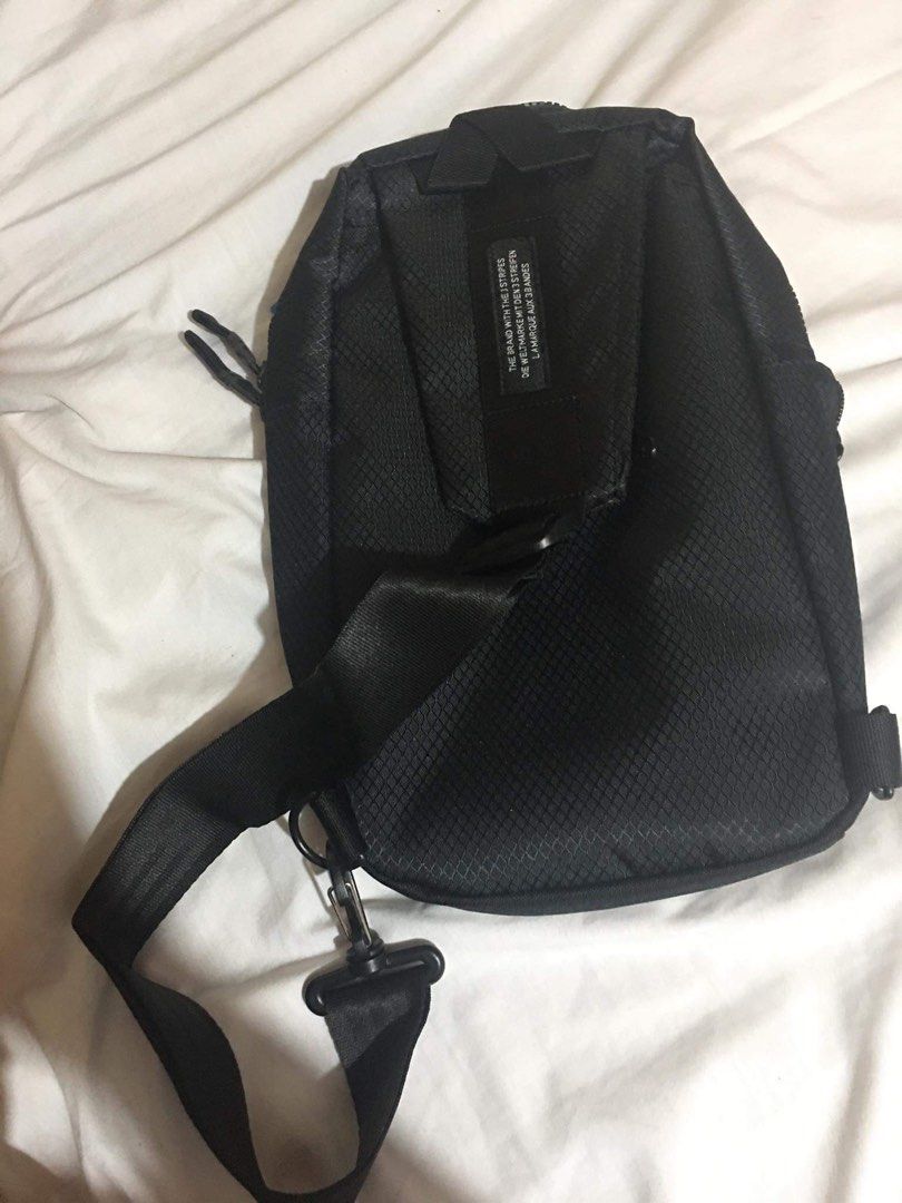 Adidas black crossbody sling bag (Category: Sling Bags) located in Manila. Submitted by s_czch (Listing ID 1465902769, Image 2). Description: - Brand new with original tag attached - Durable black textured ripstop material - Secure main zip compartment and extra front zip pocket - Iconic white Adidas trefoil logo patch - Adjustable black strap with convenient clip attachment ‼️Price is negotiable 📍Meetup around SM North Edsa or UST.