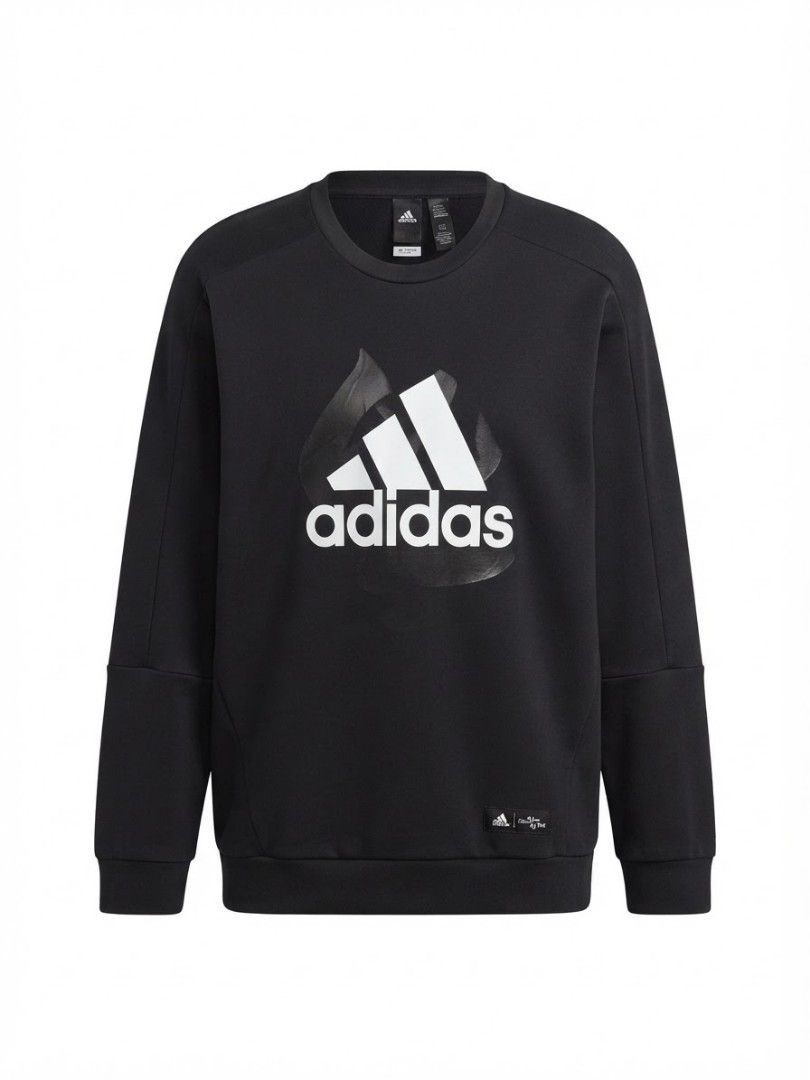 Adidas Black Graphic Sweatshirt (Category: Coats, Jackets and Outerwear) located in Talavera. Submitted by jamiegenc (Listing ID 1465891654, Image 1). Description: - Color: Black with large white chest logo 29x23 - Material: Warm and comfortable fabric - Design: Ribbed crew neck, cuffs, and hem with stylish panel detailing on sleeves and body - Details: Small branded patch near the bottom hem - Versatility: Clean, classic sportswear look that is 