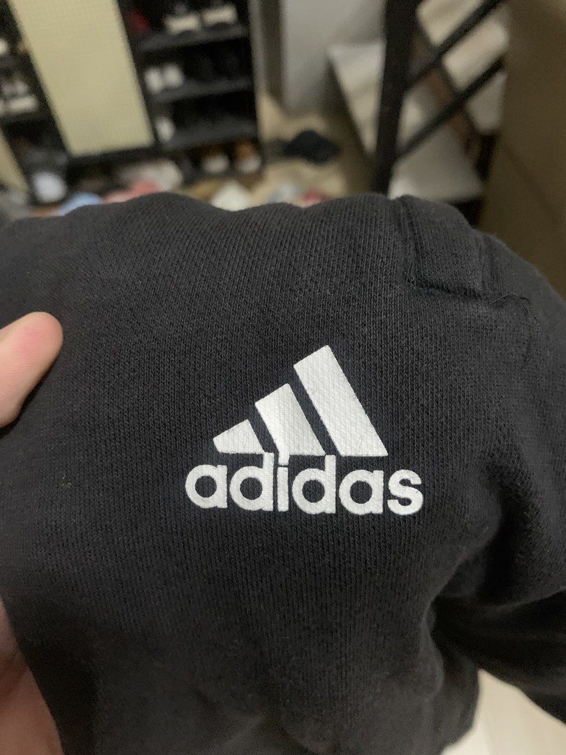 Adidas Black Sweatpants DM7311 Size L (Category: Joggers) located in Manila. Submitted by thrifty111 (Listing ID 1465924880, Image 3). Description: - Brand: Adidas - Color: Black with white three stripes near the cuffs - Size: Large (180/86A on tag) - Style Code: DM7311 - Features: Adjustable drawstring waistband and functional side pockets - Origin: Made in China - Condition: Classic athletic fit, perfect for daily wear or workouts - Trusted Car
