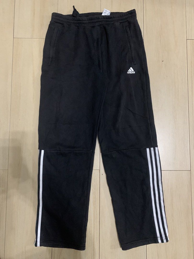 Adidas Black Sweatpants DM7311 Size L (Category: Joggers) located in Manila. Submitted by thrifty111 (Listing ID 1465924880, Image 1). Description: - Brand: Adidas - Color: Black with white three stripes near the cuffs - Size: Large (180/86A on tag) - Style Code: DM7311 - Features: Adjustable drawstring waistband and functional side pockets - Origin: Made in China - Condition: Classic athletic fit, perfect for daily wear or workouts - Trusted Car