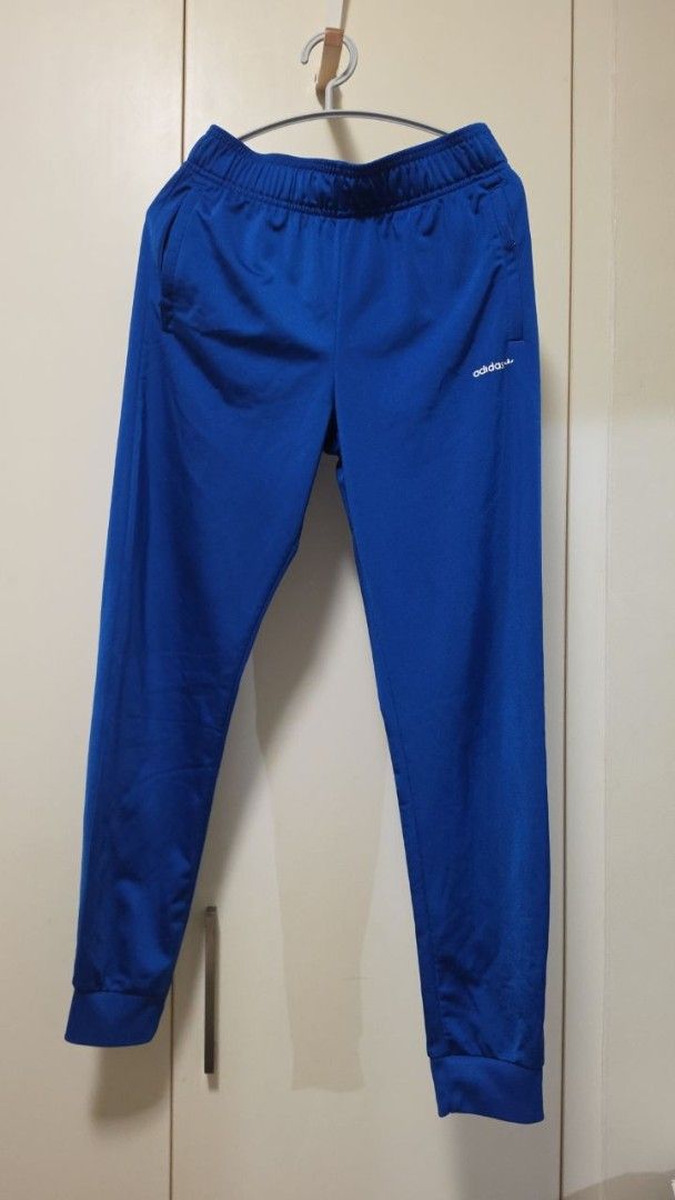Adidas Blue Track Pants Joggers (Category: Other Bottoms) located in Pasig City. Submitted by noelrb (Listing ID 1465810048, Image 1). Description: Adidas joggers Age 13-14 Fits womens xs-s.