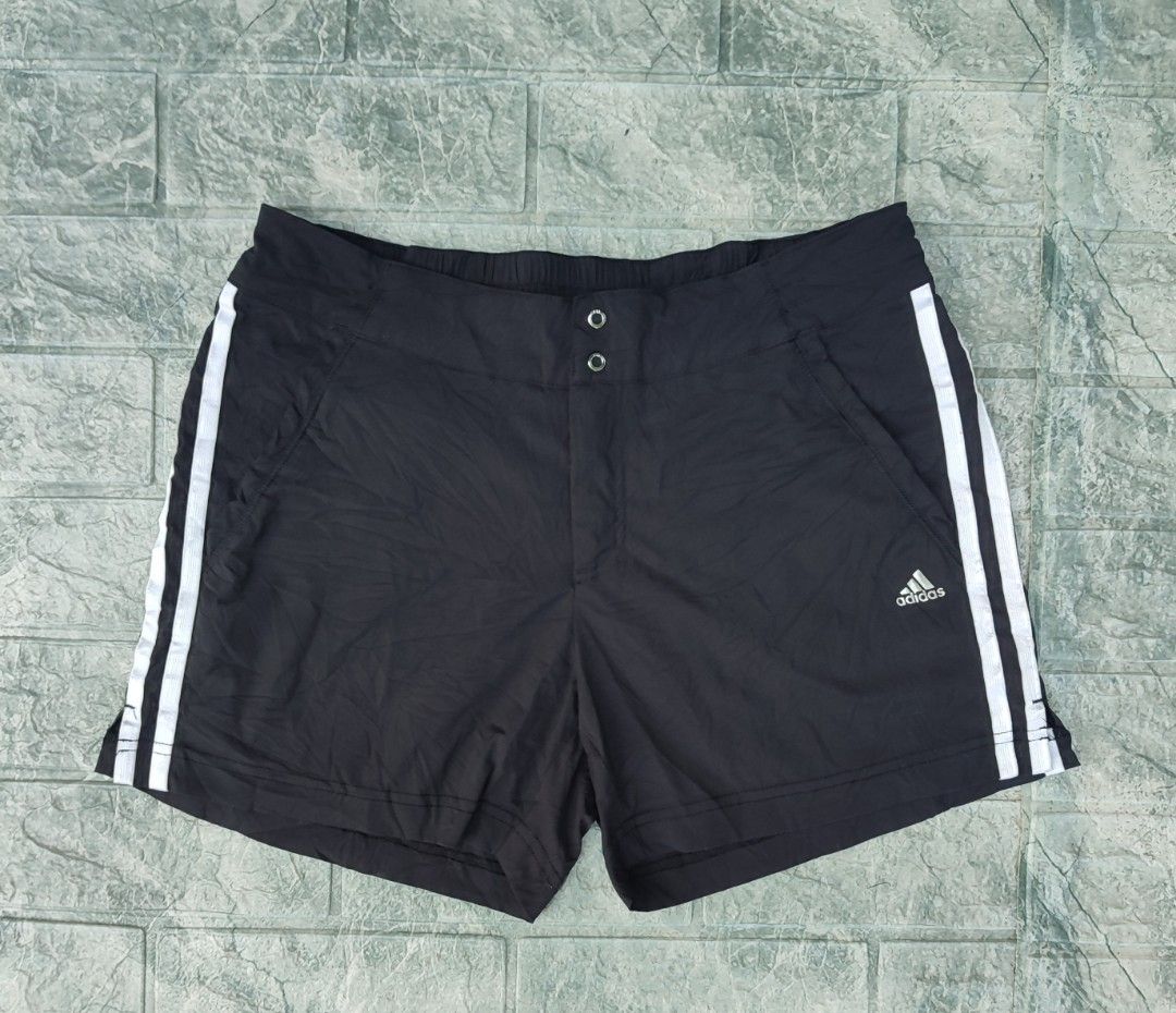 Adidas Climalite Black Athletic Shorts (Category: Shorts) located in Bayambang. Submitted by mon10192816 (Listing ID 1465874601, Image 3). Description: - Waist 31-34 - Lenght 13 - Issue Loose Stitch check last photo - Brand: Adidas - Style: Athletic shorts with iconic white 3-stripe design - Technology: Climalite fabric keeps you dry and cool during workouts - Features: Elastic waistband with front snap button closure and convenient side pockets 