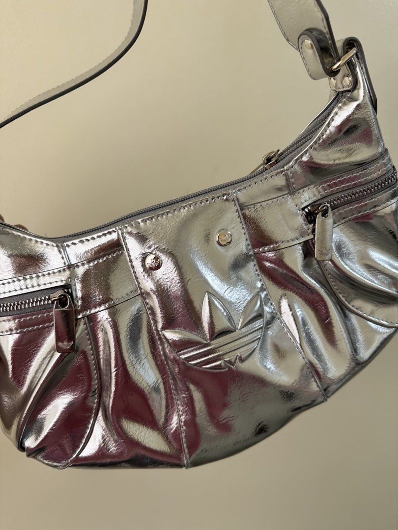 ADIDAS hobo silver bag (Category: Shoulder Bags) located in Manila. Submitted by justshop.ph (Listing ID 1465848336, Image 1). Description: bought from HK.