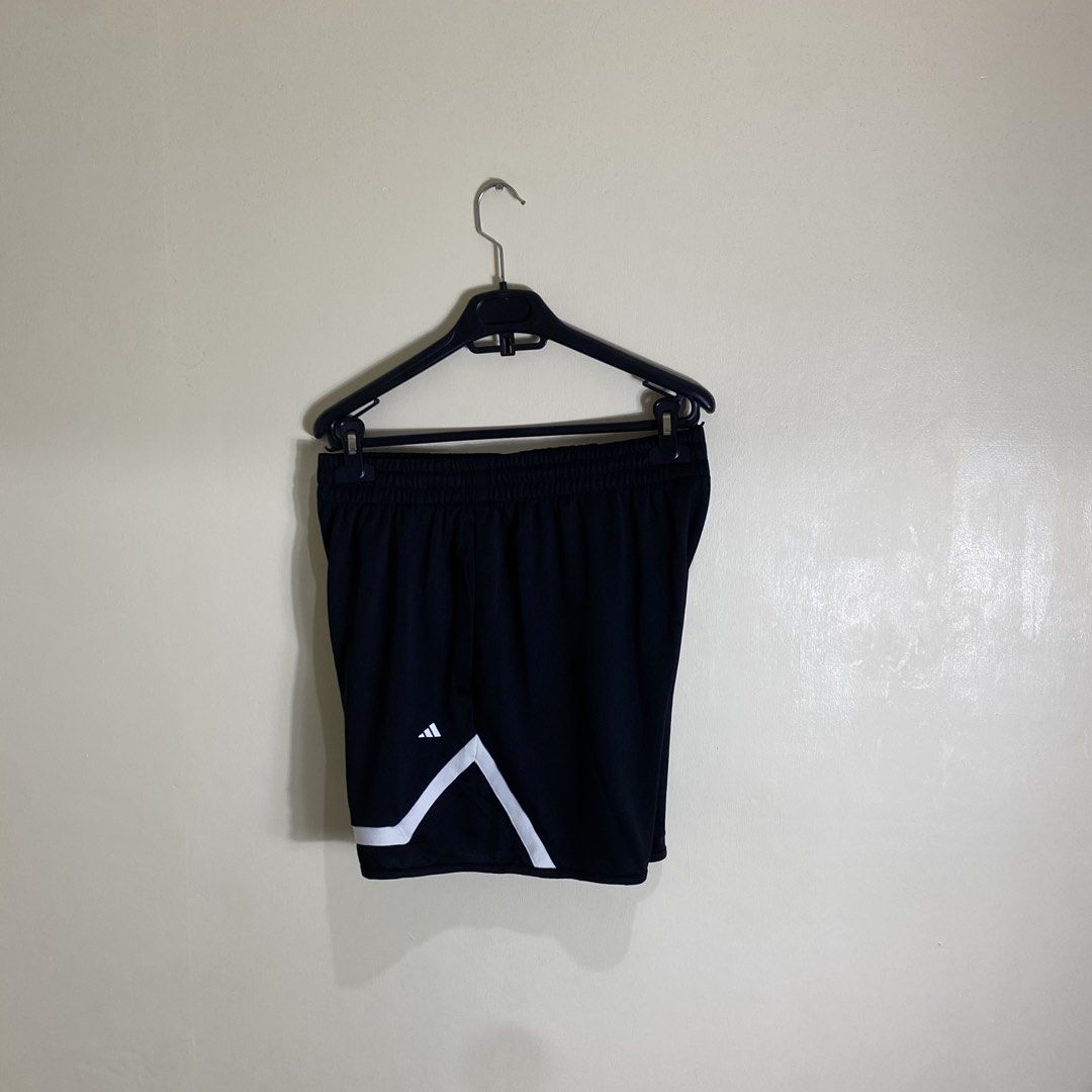 Adidas Pro Block Shorts Black Size M (Category: Shorts) located in Cebu City. Submitted by theloose.thread (Listing ID 1465919697, Image 1). Description: - Brand: Adidas Pro Block Shorts - Color: Black with white graphic contrast panel - Size: Medium (M) with 5-inch inseam - Material: 100% recycled polyester - Waistband: Elastic with internal drawstring - Condition: Brand new with tags attached - Ideal for workouts, sports, or casual streetwear.