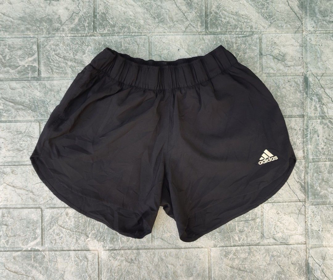 Adidas Response Climacool Running Shorts (Category: Shorts) located in Bayambang. Submitted by mon10192816 (Listing ID 1465873534, Image 3). Description: - Waist 24-29 - Length 11.5 - Issue Missing Drawstring - Brand: Adidas - Color: Black - Technology: Climacool for breathability - Features: Elastic waistband, secure side zip pocket, and reflective branding - Material: Lightweight and comfortable - Fit: Standard fit, easy to pair with any sports