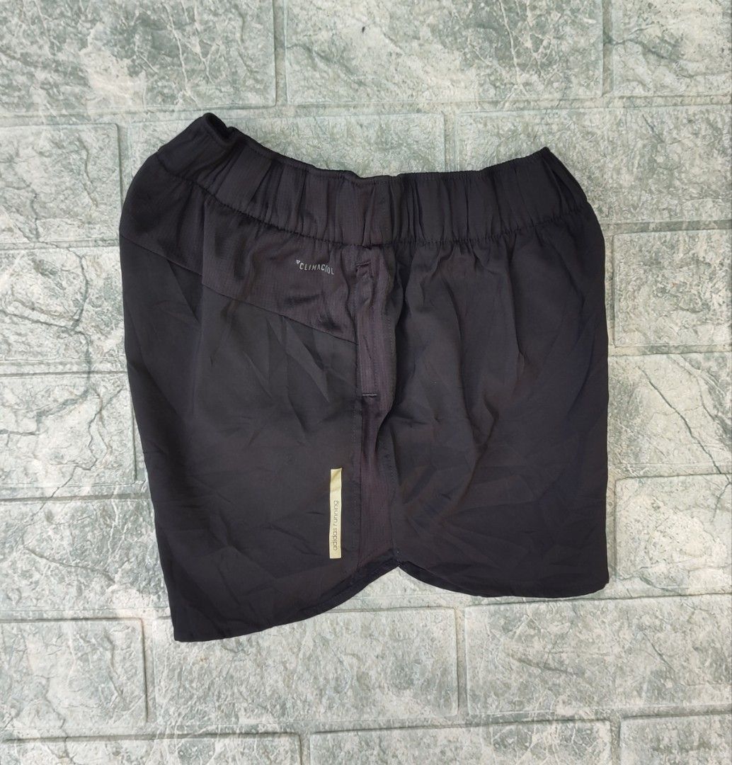 Adidas Response Climacool Running Shorts (Category: Shorts) located in Bayambang. Submitted by mon10192816 (Listing ID 1465873534, Image 2). Description: - Waist 24-29 - Length 11.5 - Issue Missing Drawstring - Brand: Adidas - Color: Black - Technology: Climacool for breathability - Features: Elastic waistband, secure side zip pocket, and reflective branding - Material: Lightweight and comfortable - Fit: Standard fit, easy to pair with any sports