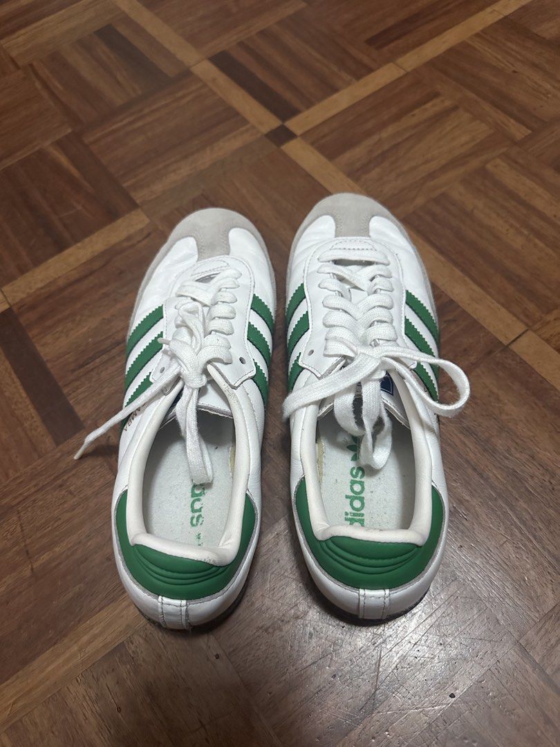 Adidas Samba White Green Size US 7.5 (Category: Sneakers) located in Davao. Submitted by fashiondeclutter11 (Listing ID 1465784283, Image 2). Description: - Brand/Model: Adidas Samba - Colorway: White and Green - Size: US 7.5 / UK 7 / FR 40 2/3 - Design: Classic low-top with suede toe overlay and green leather stripes and heel tab - Inclusions: Comes with laces - Origin: Made in Vietnam.
