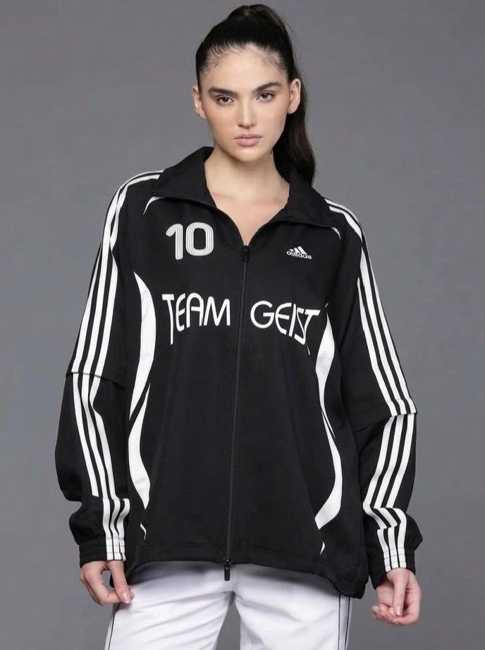Adidas Teamgeist Black Jacket Number 10 (Category: Coats, Jackets and Outerwear) located in Manila. Submitted by pdwainn84681 (Listing ID 1465901191, Image 3). Description: DIMES 26W 28L - Authentic black Adidas Teamgeist track jacket with white accents - Features printed number 10 on the front right chest and large on the back - Classic Adidas logo on the front left chest - Full zip front with a collared neckline - Signature three stripes down t