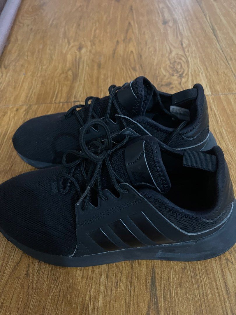 Adidas Triple Black Sneakers (Category: Sneakers) located in Manila. Submitted by ghem24 (Listing ID 1465888460, Image 3). Description: - Brand/Model: All-black Adidas sneakers - Size: US 4 / UK 3.5 - Design: Breathable mesh upper with iconic three stripes - Comfort: Cushioned sole, perfect for daily wear - Condition: Clean and ready to wear - Inclusions: Laces included.