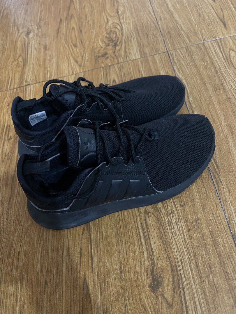 Adidas Triple Black Sneakers (Category: Sneakers) located in Manila. Submitted by ghem24 (Listing ID 1465888460, Image 1). Description: - Brand/Model: All-black Adidas sneakers - Size: US 4 / UK 3.5 - Design: Breathable mesh upper with iconic three stripes - Comfort: Cushioned sole, perfect for daily wear - Condition: Clean and ready to wear - Inclusions: Laces included.