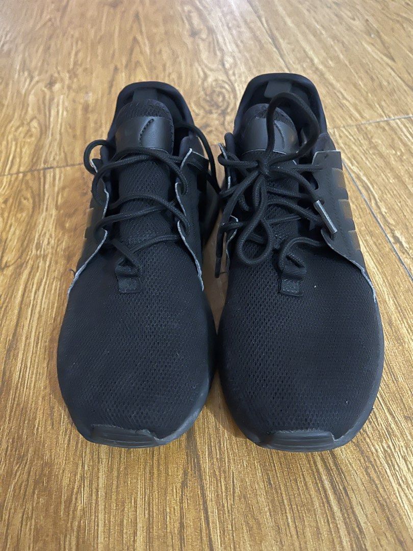 Adidas Triple Black Sneakers (Category: Sneakers) located in Manila. Submitted by ghem24 (Listing ID 1465888460, Image 2). Description: - Brand/Model: All-black Adidas sneakers - Size: US 4 / UK 3.5 - Design: Breathable mesh upper with iconic three stripes - Comfort: Cushioned sole, perfect for daily wear - Condition: Clean and ready to wear - Inclusions: Laces included.