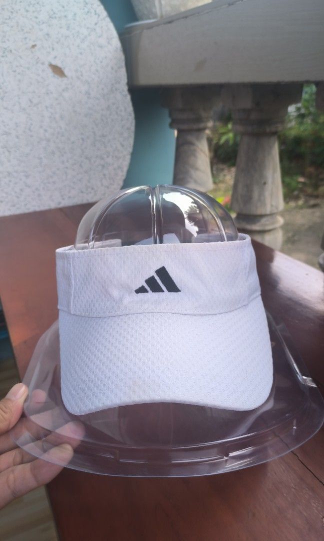 Adidas visor (Category: Hats & Beanies) located in Argao. Submitted by royalowl-888 (Listing ID 1465763719, Image 1). Description: adidas visor authentic with easy access strap at the back pang pickle, golf, running nyo po excellent to as new condition white na white 9.8/10 condition no issue location visayas.