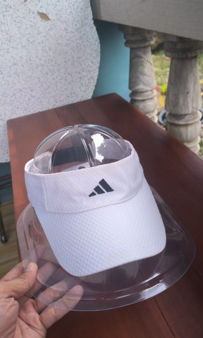 Adidas visor (Category: Hats & Beanies) located in Argao. Submitted by royalowl-888 (Listing ID 1465763719, Image 2). Description: adidas visor authentic with easy access strap at the back pang pickle, golf, running nyo po excellent to as new condition white na white 9.8/10 condition no issue location visayas.