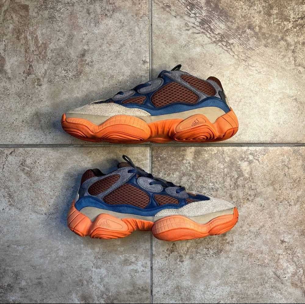 Adidas Yeezy 500 Enflame Sneakers (Category: Sneakers) located in Mandaluyong City. Submitted by bethco (Listing ID 1465848613, Image 3). Description: - Brand: Adidas Yeezy 500 - Colorway: Enflame (Brown mesh, blue leather, suede mudguard) - Sole: Vibrant orange chunky midsole with clean tread patterns - Design: Distinctive bulbous profile and bold color blocking - Condition: Neat laces, well-maintained, and ready to wear - Location: Ships from P