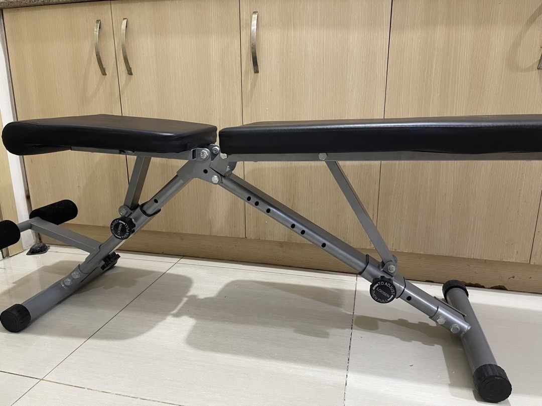 Adjustable Weight Bench Workout Exercise Gym (Category: Weights & Dumbbells) located in Manila. Submitted by anrmarchad69199 (Listing ID 1465863288, Image 2). Description: Reason for selling: now have better access to a gym For more details (e.g. product details) kindly message me. I will send the link where I originally bought it. - Adjustable workout bench for flat and incline exercises - Sturdy grey steel frame with comfortable black padded vi