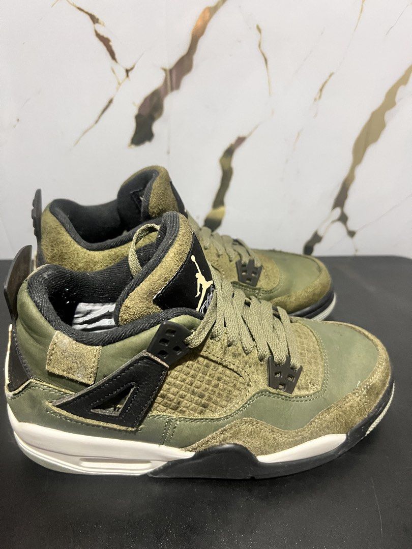 Air Jordan 4 Retro Medium Olive (Category: Sneakers) located in Caloocan City. Submitted by queensproduct (Listing ID 1465814926, Image 2). Description: - Color/Material: Green suede with black and white accents - Design: Classic mesh side panels and iconic flight branding on the tongue - Condition: Rubber outsoles show minor wear, but soles are clean underneath with great traction left - Inclusions: No box included - Perfect for daily wear or ad