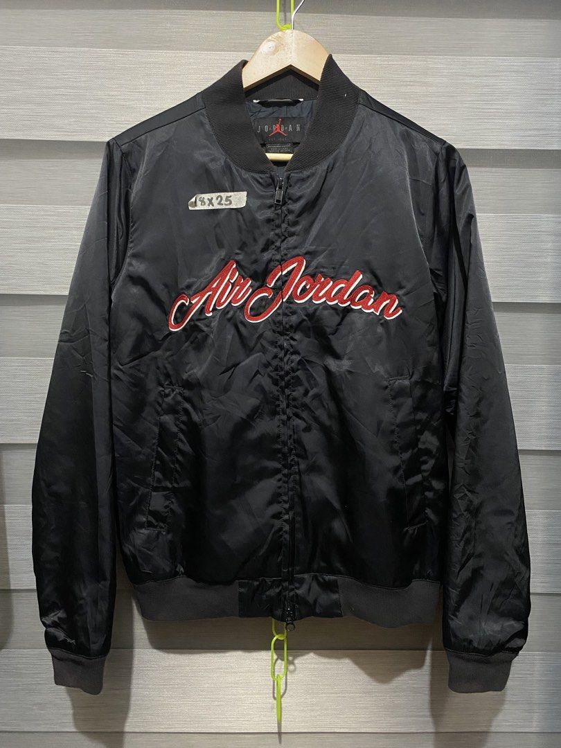 Air Jordan Black Bomber Jacket (Category: Coats, Jackets and Outerwear) located in Butuan. Submitted by nielben13 (Listing ID 1465901492, Image 1). Description: - Brand: Jordan - Item: Black bomber jacket with red embroidered cursive 'Air Jordan' lettering - Details: Full zip front, ribbed collar and cuffs, two front pockets - Size: Tagged P (fits like Small to Medium based on 18" x 25" measurements) - No issue Solid sa personal .