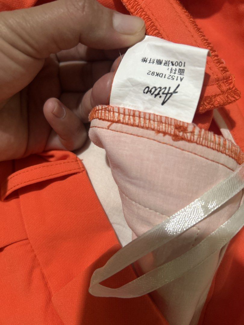 Aitoo Bright Orange Tailored Shorts Size S (Category: Shorts) located in Lal-Lo. Submitted by pureearth_8c747c (Listing ID 1465827935, Image 3). Description: - Brand: Aitoo - Size: S (fits 155/64A) - Color: Vibrant orange - Material: 100% lightweight & smooth polyester - Features: Clean waistline, front pleats, and practical side pockets - Closure: Button closure with zip fly - Condition: Good, ready to wear - Perfect for: Summer wear and casual 