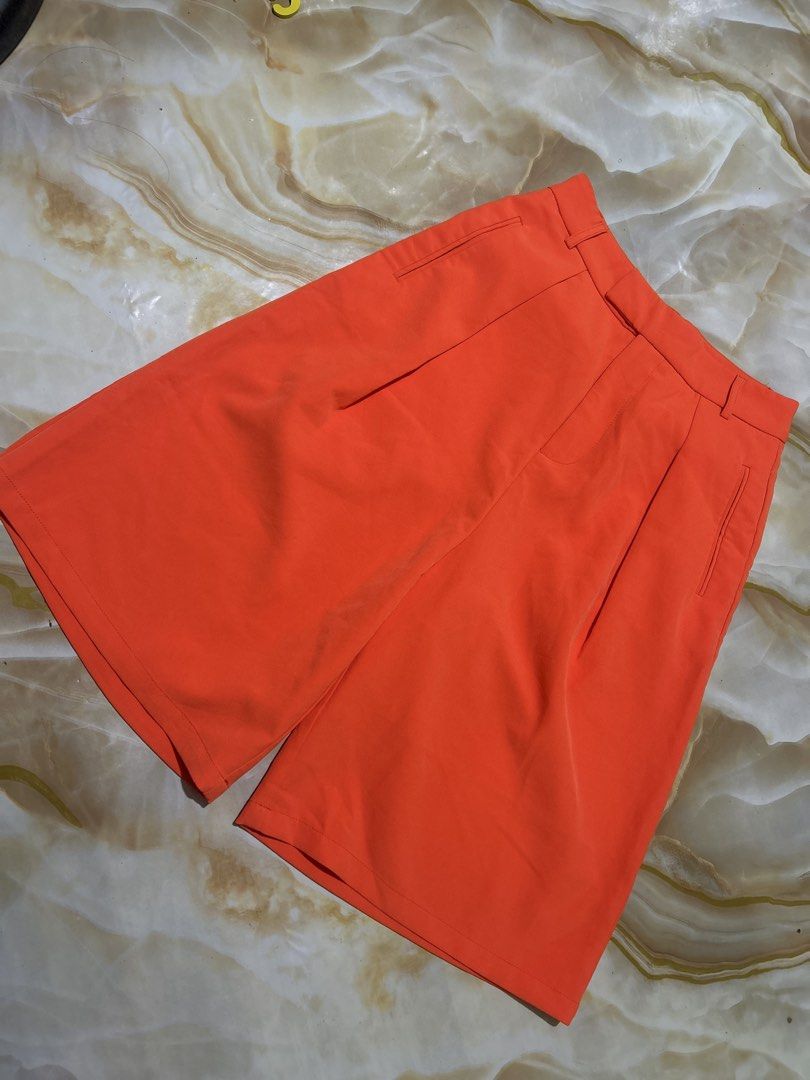 Aitoo Bright Orange Tailored Shorts Size S (Category: Shorts) located in Lal-Lo. Submitted by pureearth_8c747c (Listing ID 1465827935, Image 1). Description: - Brand: Aitoo - Size: S (fits 155/64A) - Color: Vibrant orange - Material: 100% lightweight & smooth polyester - Features: Clean waistline, front pleats, and practical side pockets - Closure: Button closure with zip fly - Condition: Good, ready to wear - Perfect for: Summer wear and casual 