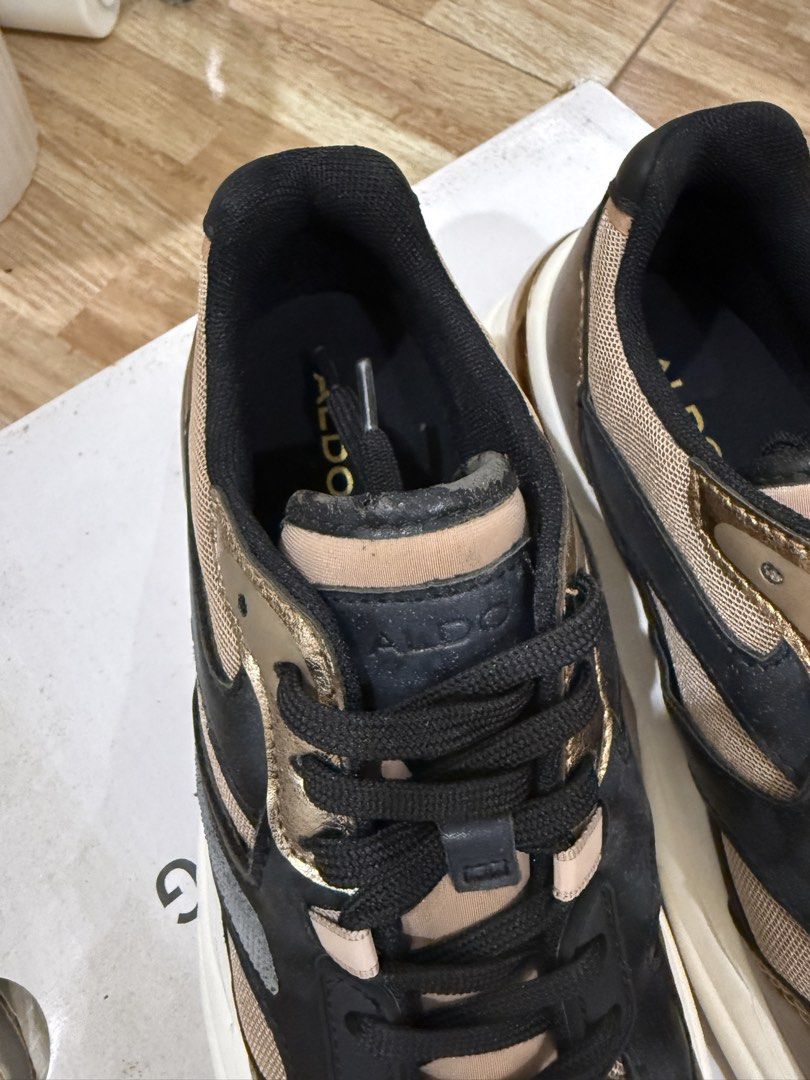 ALDO Createv2 Sneakers (Category: Sneakers) located in Quezon City. Submitted by cndcvrtc (Listing ID 1465938484, Image 2). Description: - Brand: ALDO - Model: Createv2 Chunky Sneakers - Colorway: Mix of bronze, black, and nude tones - Size: US 7 / EU 37.5 - Features: Lace-up closure with black laces and thick white soles - Inclusions: Original shoe box included - Condition: Great casual everyday footwear.