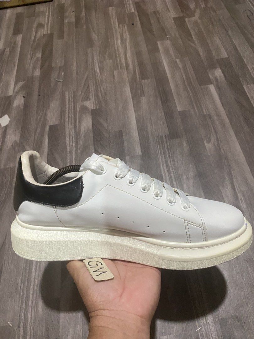 Alexander McQueen Oversized Sneaker White Black (Category: Sneakers) located in Cebu City. Submitted by freemoon.b85e0c (Listing ID 1465949569, Image 2). Description: Alexander McQueen Oversized B/W Thrifted/2nd hand Size 10 us/44 euro/28 cm Price 980 plus sf Good condition.