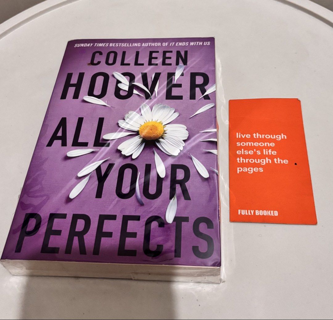 All Your Perfects by Colleen Hoover (Category: Storybooks) located in Taguig. Submitted by lizzyhernandez (Listing ID 1465948890, Image 1). Description: - Title: All Your Perfects by Colleen Hoover - Edition: Paperback with purple daisy cover - Condition: Lightly used, sealed in plastic protective film - Source: Purchased from Amazon UK - Genre: Emotional romance / contemporary fiction.