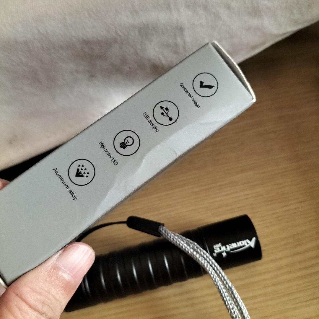 Alonefire SV99 Multifunctional Flashlight USB Charging (Category: Lighting) located in Paranaque City. Submitted by decluttering-all (Listing ID 1465795800, Image 3). Description: - Brand: Alonefire SV99 - Color: Black - Material: Durable aluminum alloy shell - Light Source: High power LED - Power: USB rechargeable with built-in lithium battery - Design: Convenient tail switch - Inclusions: Original box and wrist lanyard included p169 only used o
