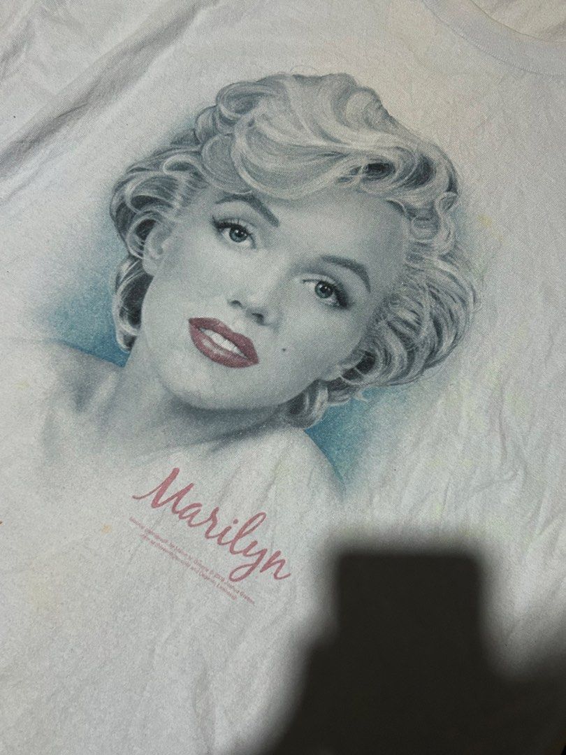 Alstyle Marilyn Monroe Graphic Tee (Category: Shirts) located in Bacolod City. Submitted by reens14 (Listing ID 1465890258, Image 2). Description: - Brand: Alstyle Apparel & Activewear - Design: Marilyn Monroe portrait graphic print on front - Color: Light blue - Style: Classic short sleeve crewneck t-shirt - Condition: Excellent.