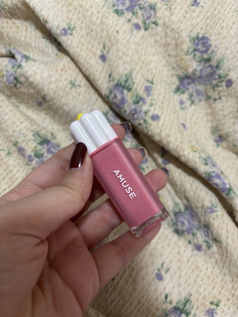 AMUSE Dew Tint 03 Healthy Boksoonga (Category: Makeup) located in Makati City. Submitted by FashionFactory (Listing ID 1465848056, Image 1). Description: - Brand: AMUSE - Product: Dew Tint - Shade: 03 Healthy Boksoonga (Light Pink) - Net Weight: 4g / 0.14 oz - Origin: Made in Korea - Expiry Date: 2028-07-19 - Special Detail: Cute flower cap design on the white applicator handle - Condition: Brand new and authentic.