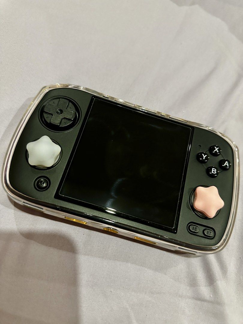Anbernic RG CubeXX Handheld Game Console (Category: Others) located in Manaoag. Submitted by muphiboo (Listing ID 1465892924, Image 1). Description: 🎮 FOR SALE: ANBERNIC RG CubeXX (64GB) 💗 Brand: ANBERNIC Price: ₱3,500 (Slightly negotiable) Lady-owned 🎀 Specifications: * 64GB with Games * 3.95-inch Display * Linux 64-bit * Supports 2.4G Wireless Controller * Supports Wired Controller Connection Inclusions & Extras: • Tempered glass installed s