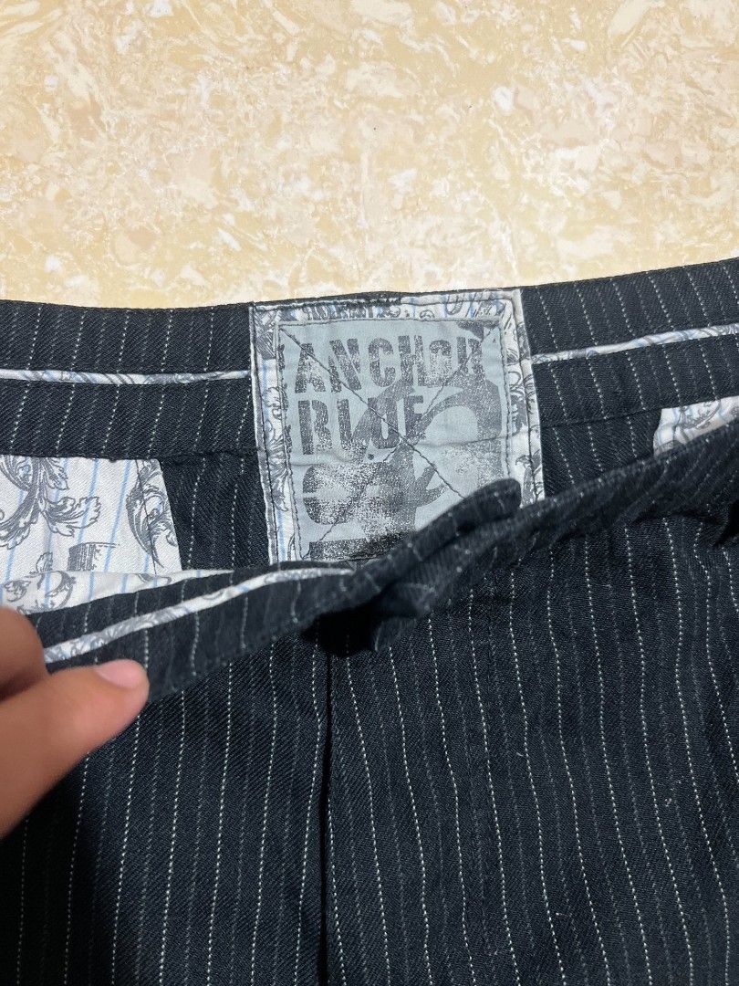 Anchor Blue Pinstripe Shorts Black (Category: Shorts) located in Bacoor. Submitted by davealvare39194 (Listing ID 1465858765, Image 3). Description: - Brand/Style: Anchor Blue pinstripe shorts - Color: Black and white - Closure: Button fly with reliable YKK zipper - Details: Subtle cross embroidery on the lower right pocket & cool printed interior lining - Fit: Structured fit, perfect for streetwear looks.