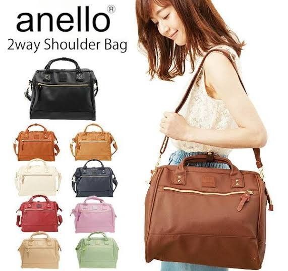 Anello Boston a4 2-way Shoulder Bag Yellow (Category: Shoulder Bags) located in Quezon City. Submitted by lisolette (Listing ID 1465897991, Image 2). Description: - Brand: Anello - Color: Mustard yellow with brown accents - Style: 2-way bag (can be hand-carried or worn as a shoulder/crossbody bag) - Includes: Matching detachable and adjustable strap - Compartments: Main compartment with secure zipper closure and front zip pocket - Material: Durab