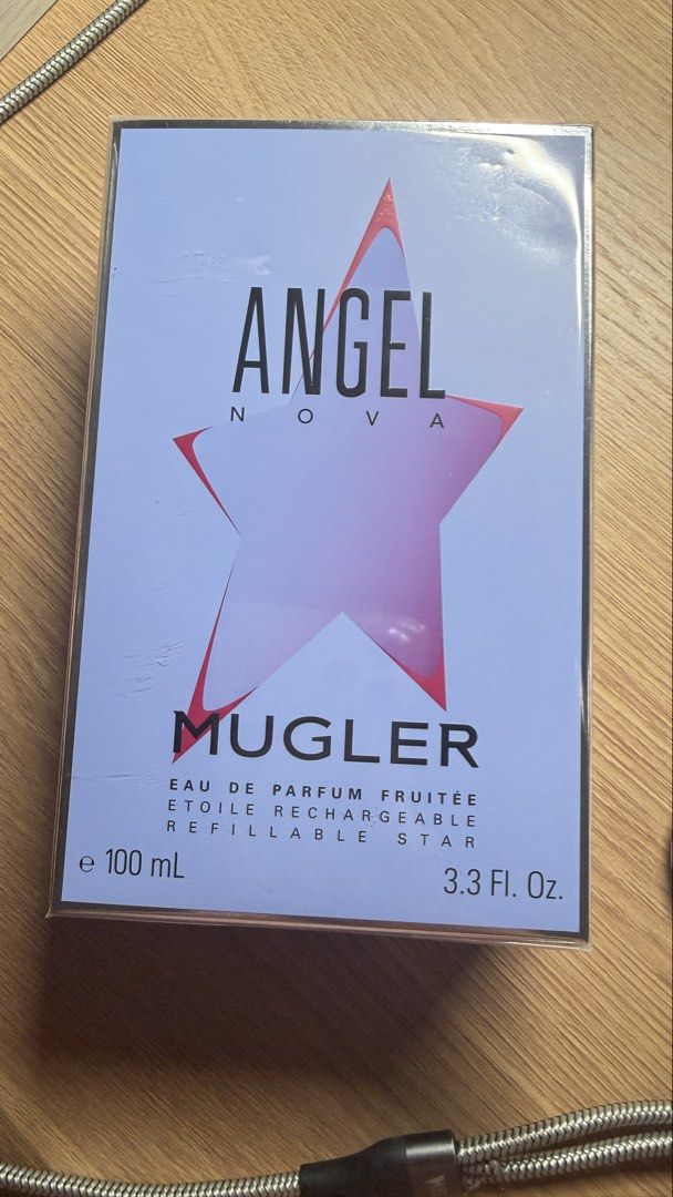 Angel Mugler Nova Eau de Parfum 100 mL (Category: Fragrance & Deodorants) located in Taytay. Submitted by thekikaymachine (Listing ID 1465909065, Image 1). Description: - Brand: Mugler Angel Nova Eau de Parfum - Size: 100 mL - Scent: Bold and fruity star fragrance - Condition: Brand new, unopened, and unused - Packaging: Complete with original box and fully sealed in plastic wrapping - 100% authentic -RFS: extra bottle as seen on the 3rd pic boug