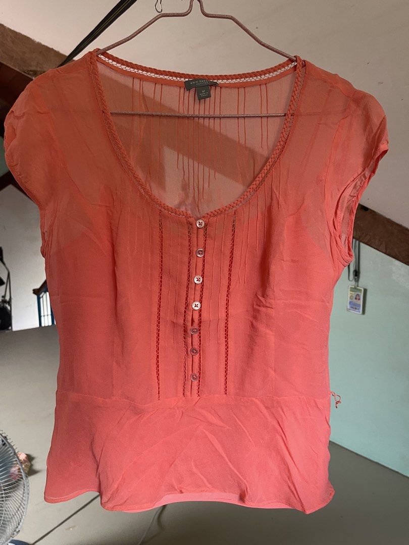 Ann Taylor Petites Coral Blouse (Category: Blouses) located in Baybay. Submitted by shikita27906 (Listing ID 1465850820, Image 1). Description: - Brand: Ann Taylor Petites - Size: SP (Petite Small) - Color: Coral - Material: Lightweight, breathable fabric - Details: Button-down front (7 white buttons), round neck with braided trim, sheer yoke panel, vertical pleated pin tucks.